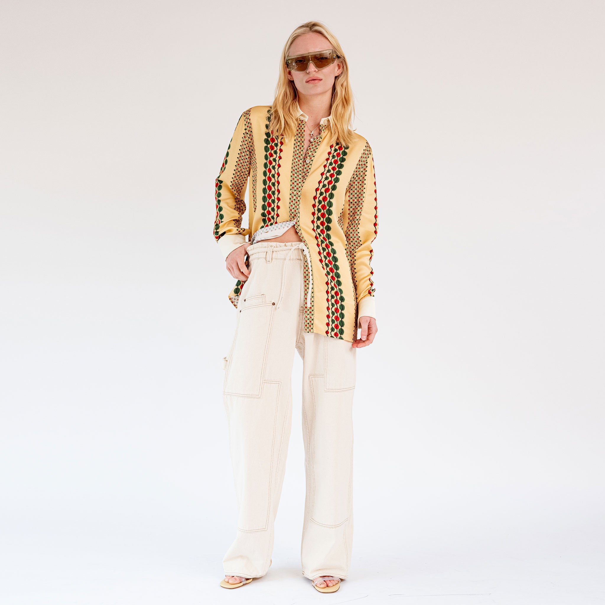 Full body photo of model wearing the Paperbag Carpenter Pant - Natural. 