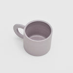 Above image of the petal mug in lavender by Ekua Ceramics.