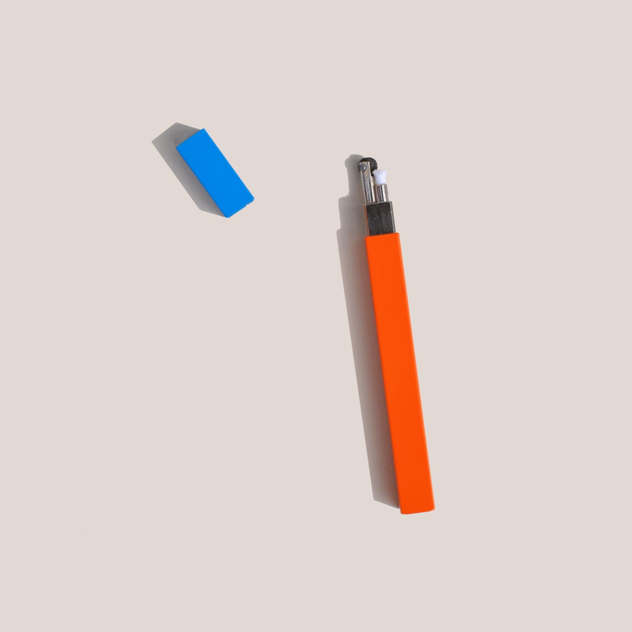 Tsubota Pearl - Queue Stick Lighter - Orange / Turquoise, available at LCD.