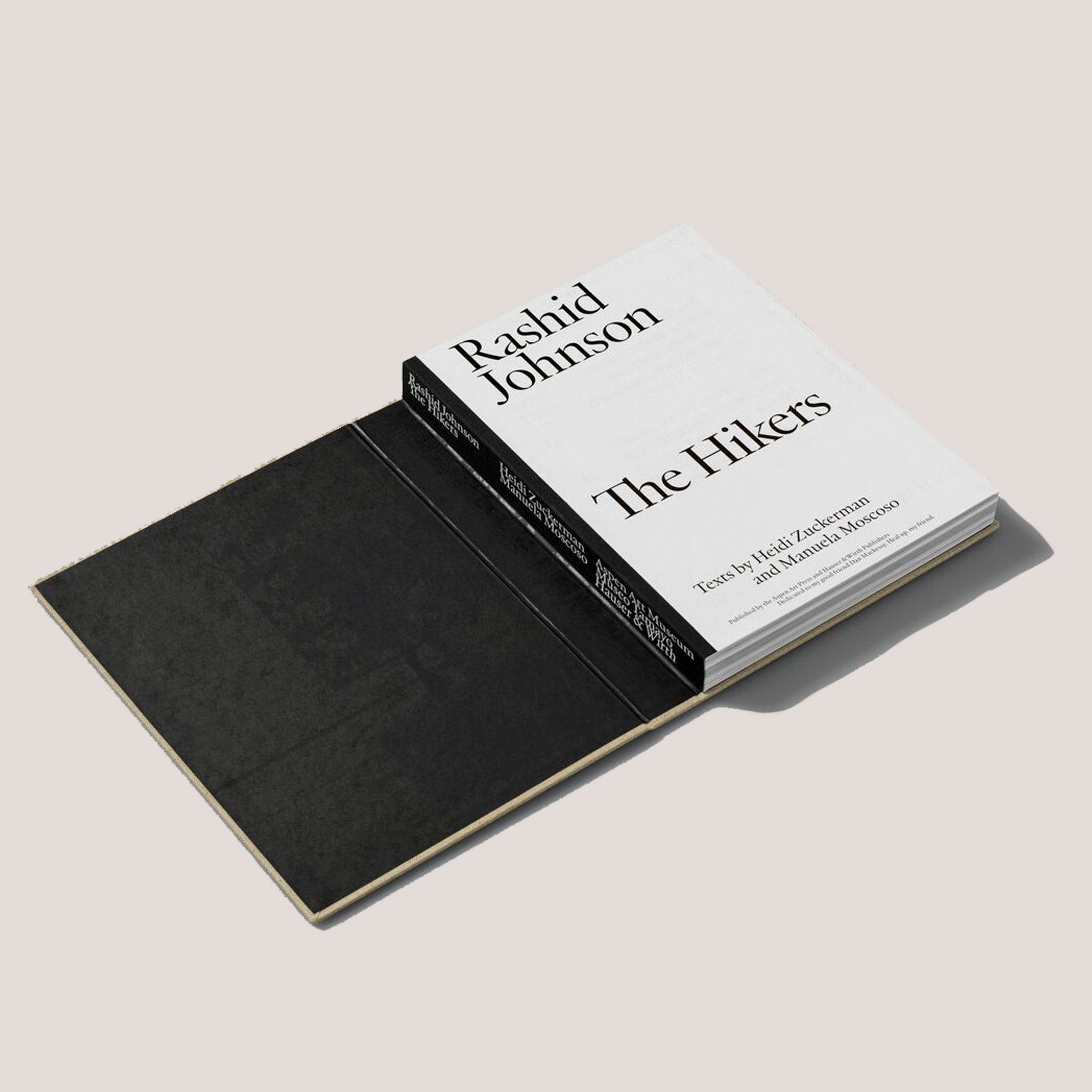 Angled photo showing the inside binding of Rashid Johnson's book, Hikers.