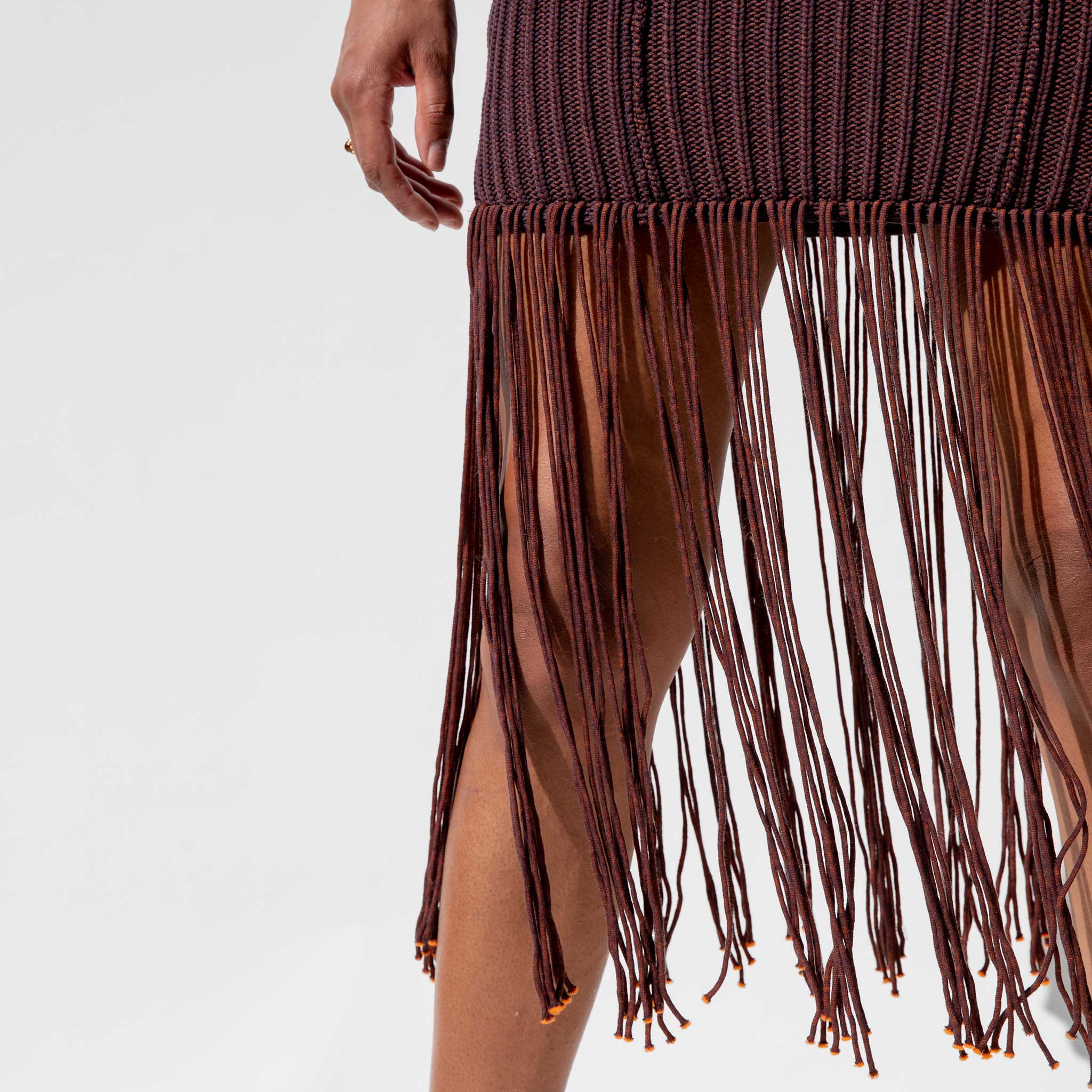 Close detail photo of the fringe on the Rope Dress - Oxblood