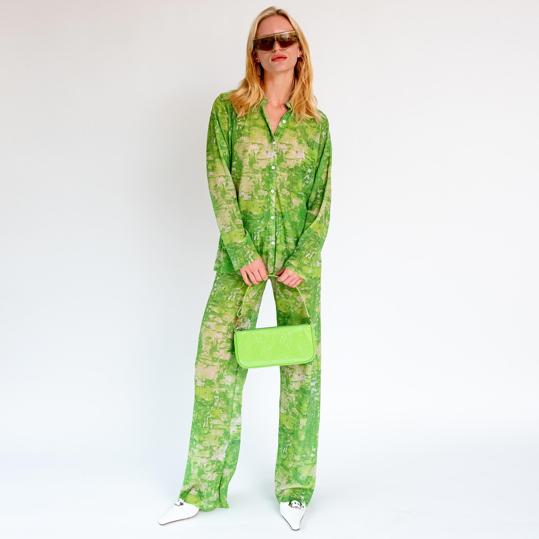 Full body photo of model wearing the Sway Mesh Plisse Pants - Green Riddle.