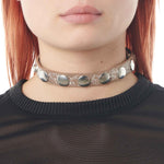 Close detail photo of model wearing the Snap Necklace.