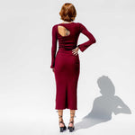 Back full body photo of model wearing the Space Dress - Burnt Burgundy.