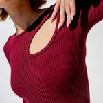 Close detail photo of model wearing the Space Dress - Burnt Burgundy.