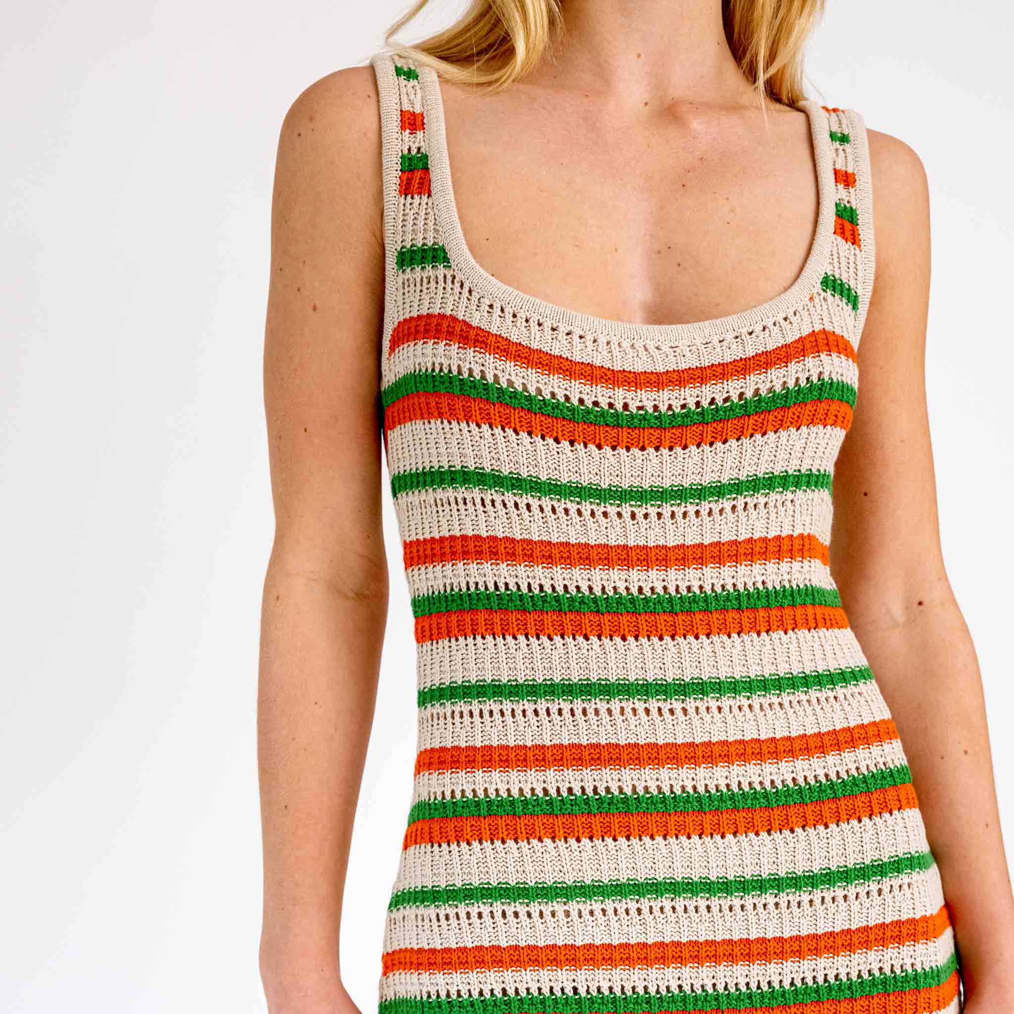 Close detail photo of model wearing the Striped Knit Midi Dress - Green Orange.