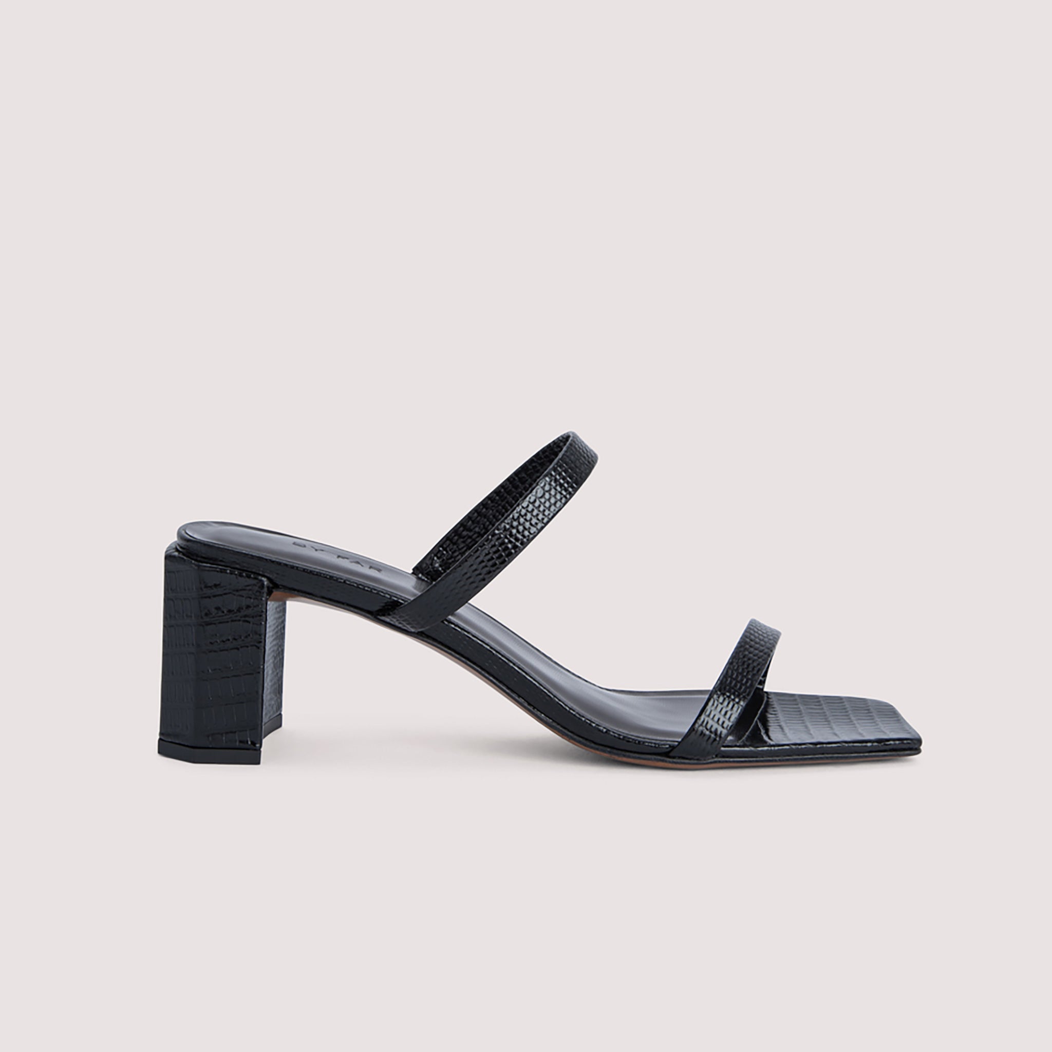 Side view of the Tanya Mules - Black on a white background.