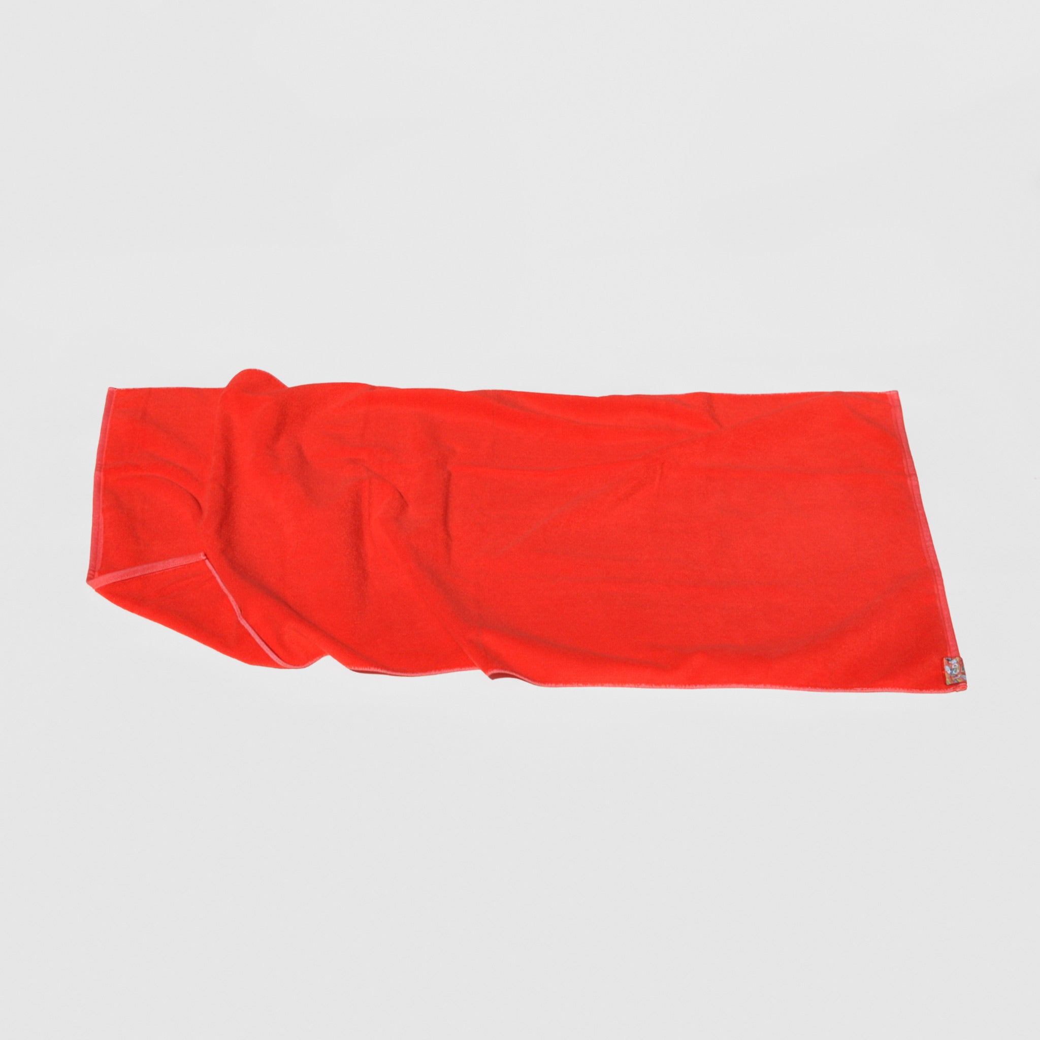 Full image of the jacquard beach & bath towel in light red by LCD.