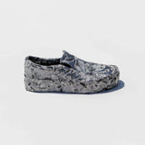 Side view of the Collina Strada embellished Vans Slip Ons with hand-wrapped Silver Jacquard floral fabric.