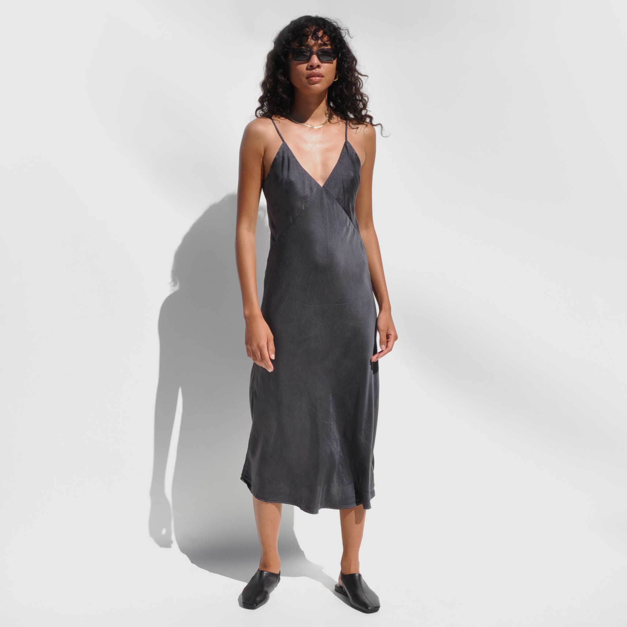 Front full body photo of model wearing the Vee Midi Slip Dress - Smoke