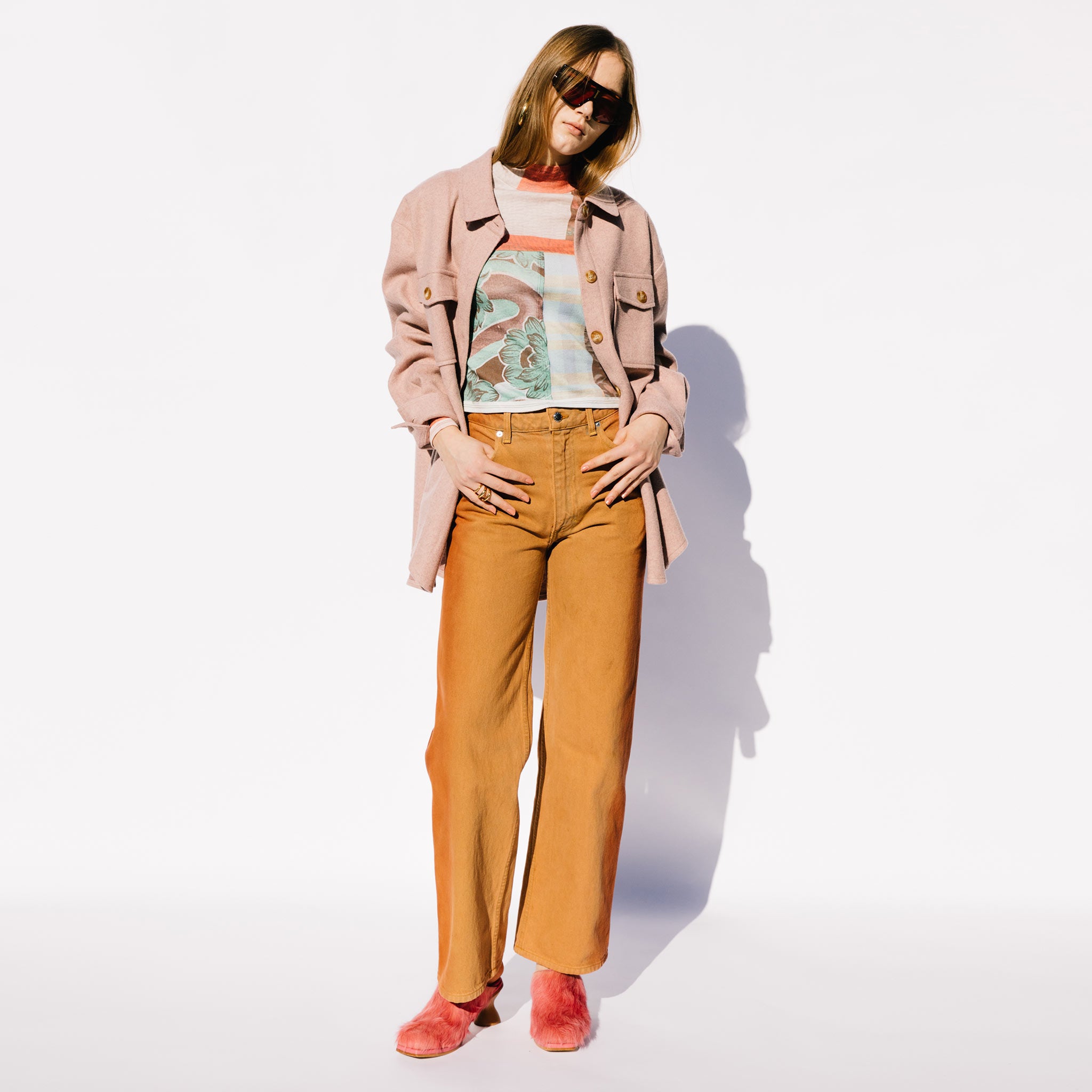 Full body photo of model wearing the Wide Leg Jean - Terracota.