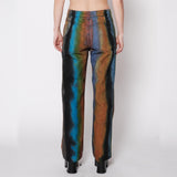 Back half body photo of model wearing the Wide Leg Jean - Geode.