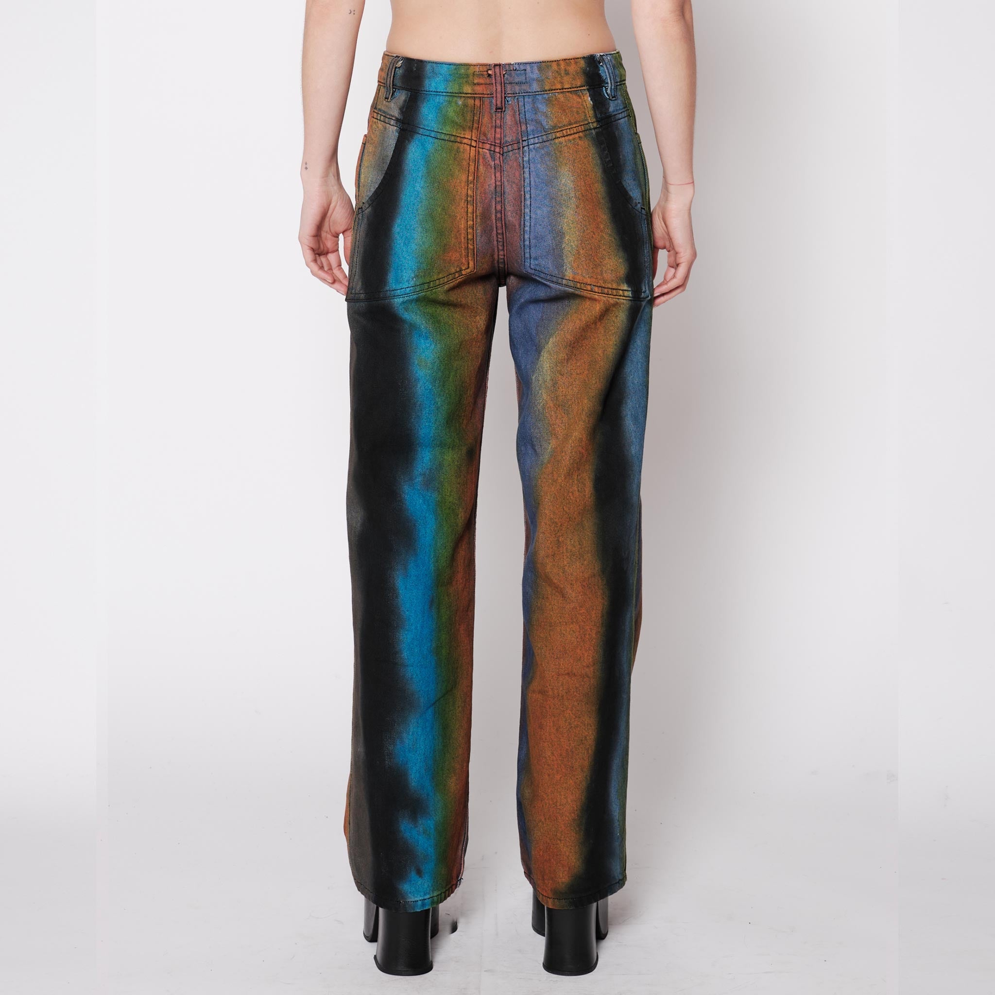Back half body photo of model wearing the Wide Leg Jean - Geode.