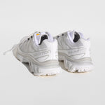 Back image of the XT-6-white sneakers by Salmon sport style in white. These sneakers are white with their rainbow logo down the middle tongue.