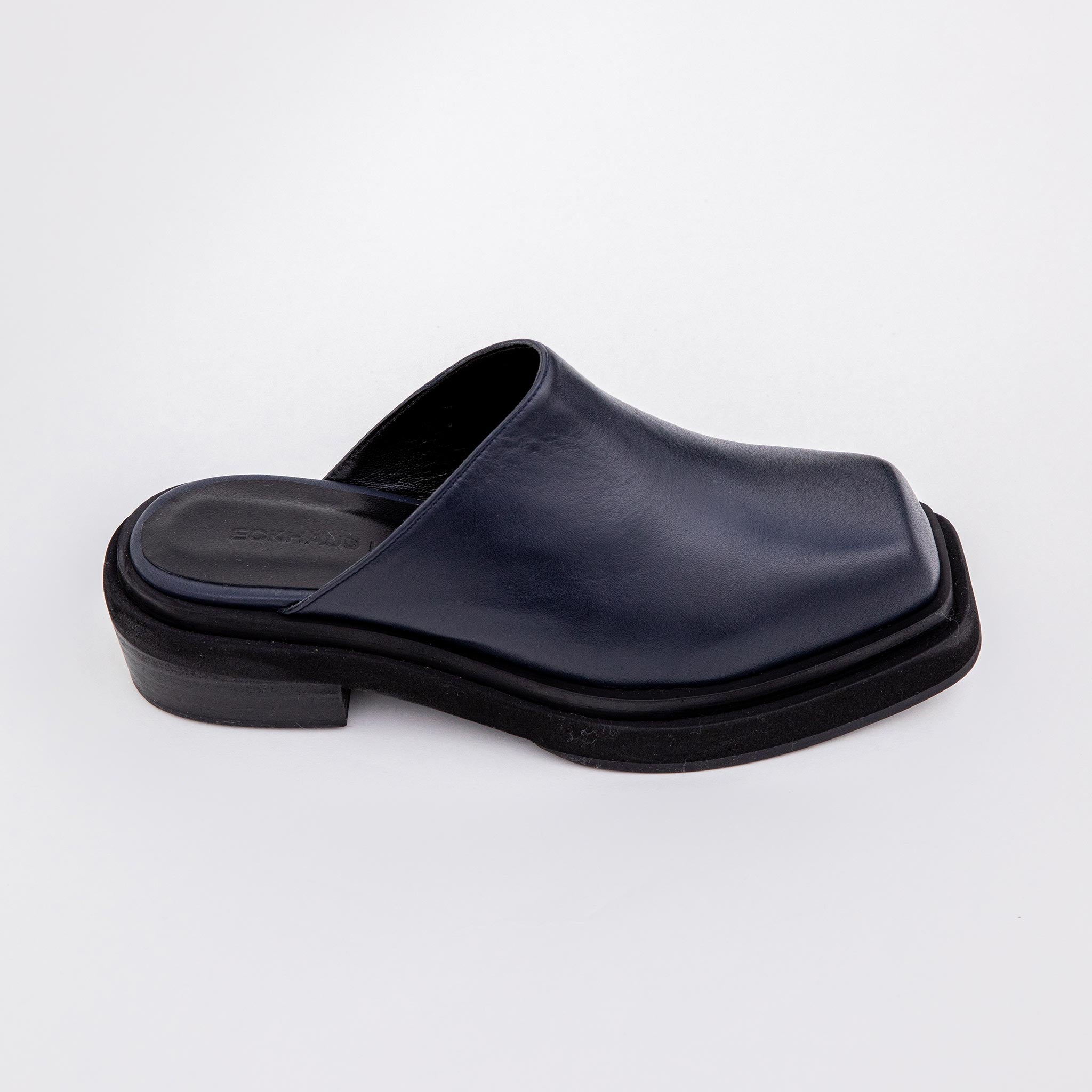 Side photo of the Zoe Clog - Black.