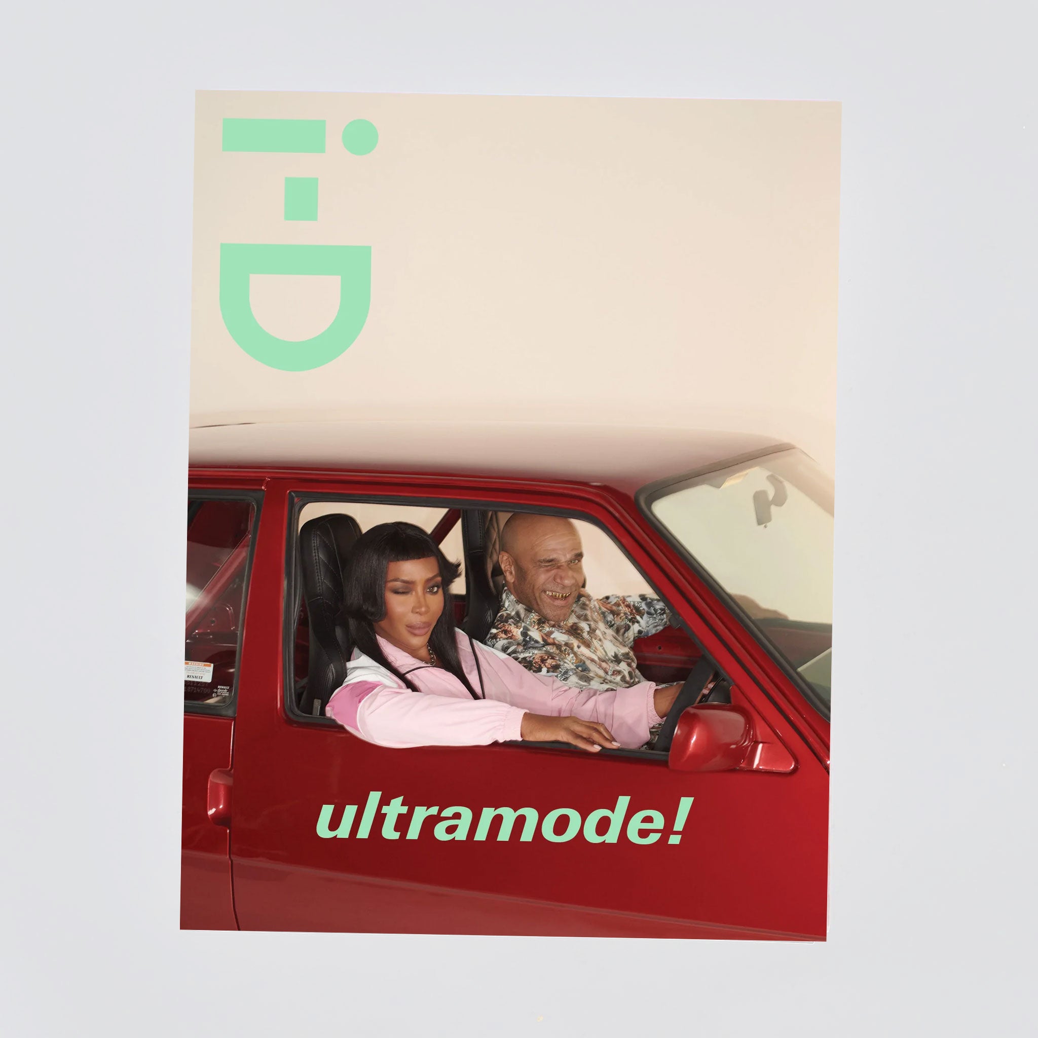 Cover photo of i-D Magazine issue 369 featuring Naomi Campbell looking out of a red car.